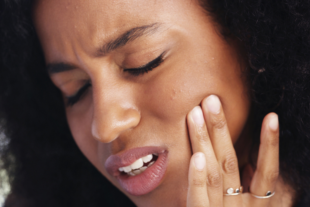 Dentist in High Park at High Park Dental Care providing TMJ jaw pain treatment